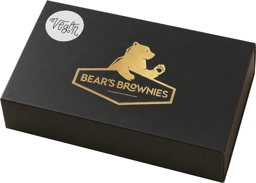 A closed kraft box tied with a terracotta ribbon and a shipping label.